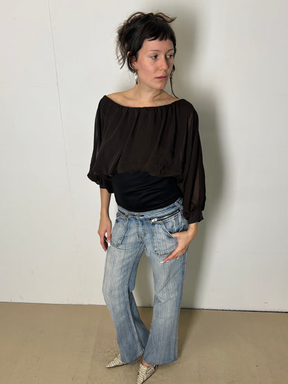 brown and black flowy blouse