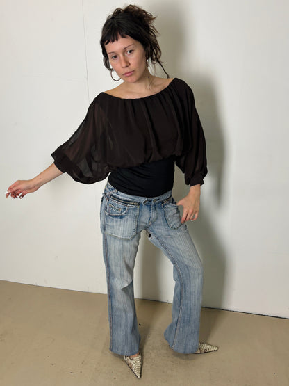 brown and black flowy blouse
