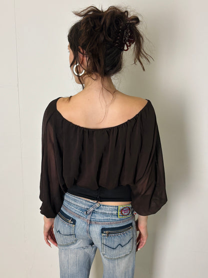 brown and black flowy blouse